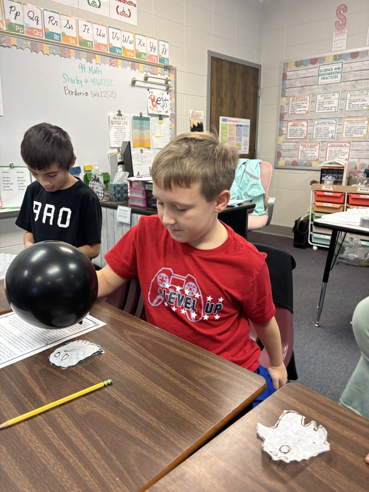 student with balloon 