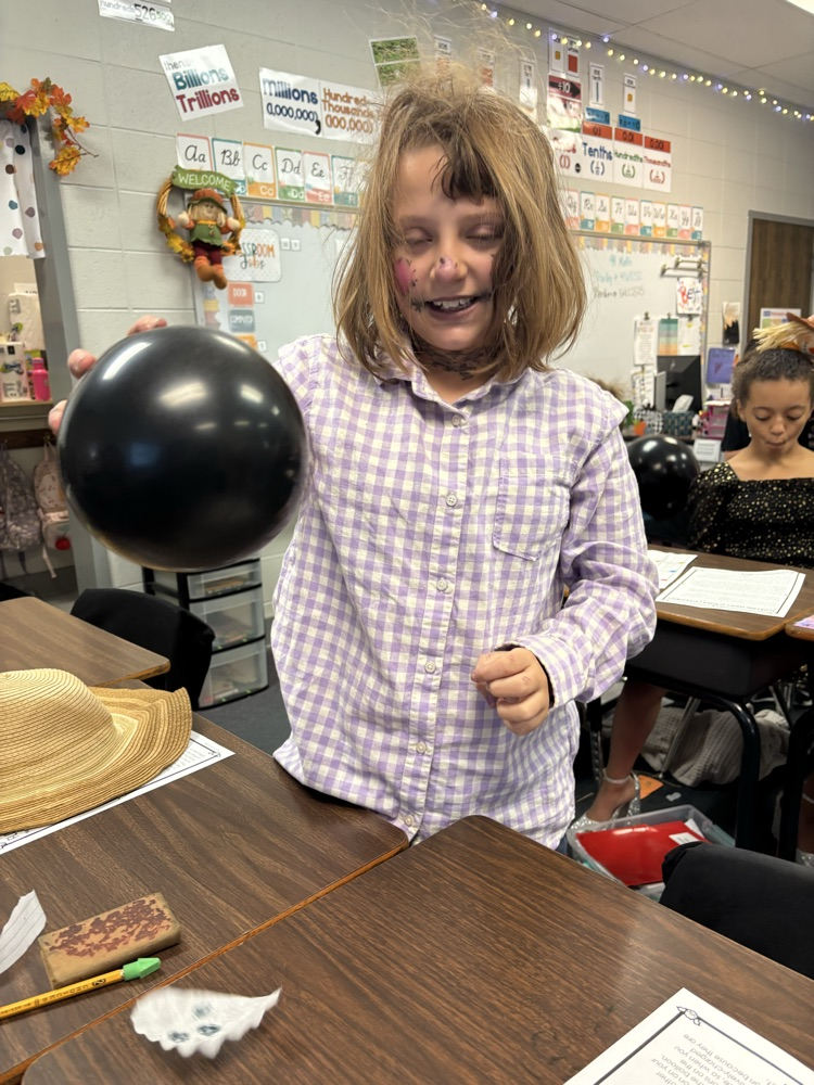 student with balloon