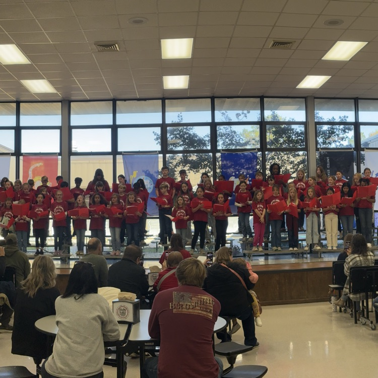 students sing during the Veterans Day program 