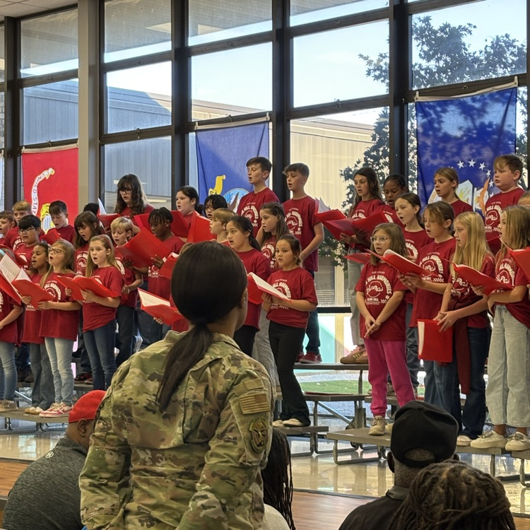soldier stands as the choir sings 