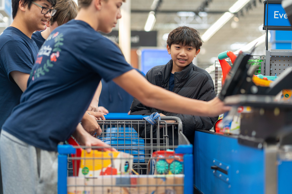 Toys for Tots - students checking out with toys 
