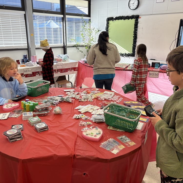 volunteer assists students with shopping 
