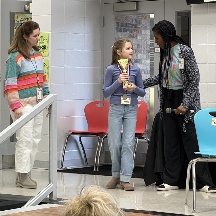 spelling be winner being presented with award 