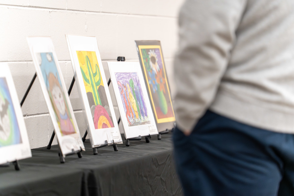 Shelby 101 attendees browse the art gallery.