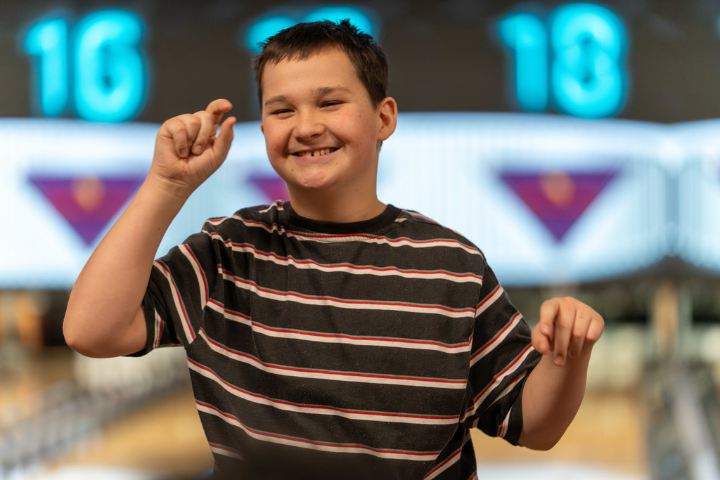 Student motions "so close" after bowling.