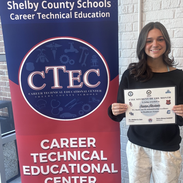 student with certificate