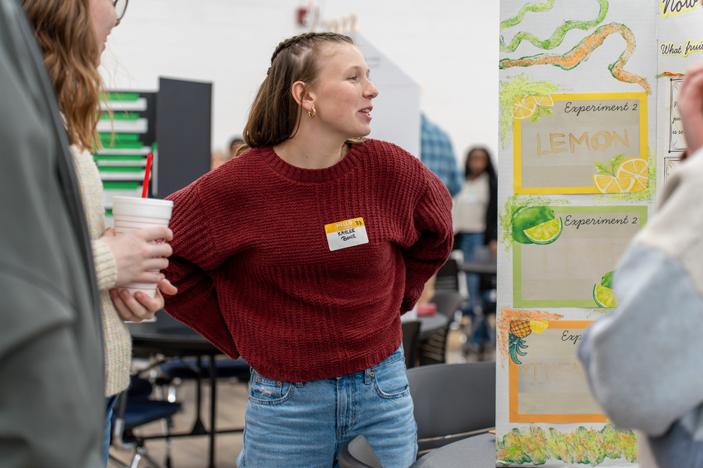 A student presents their Science Fair project.