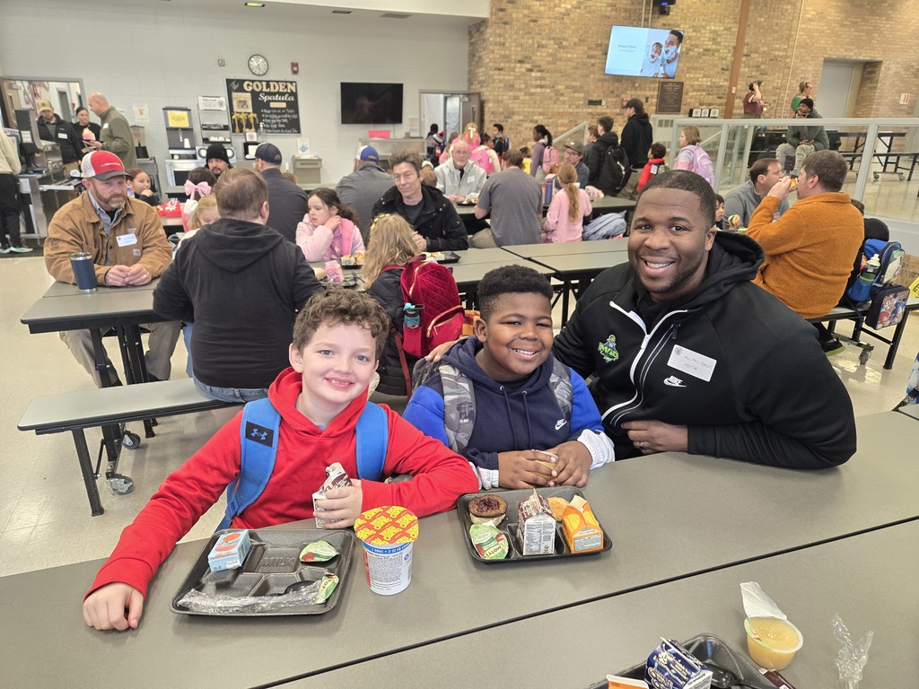 dads and students at breakfast
