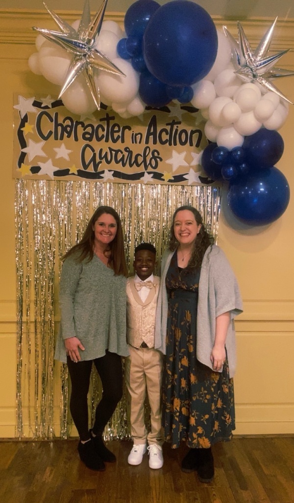 Kingston with school staff