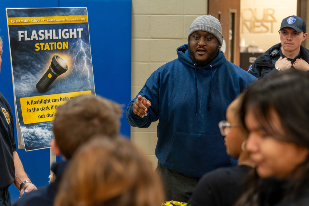 Guest speaks to students.