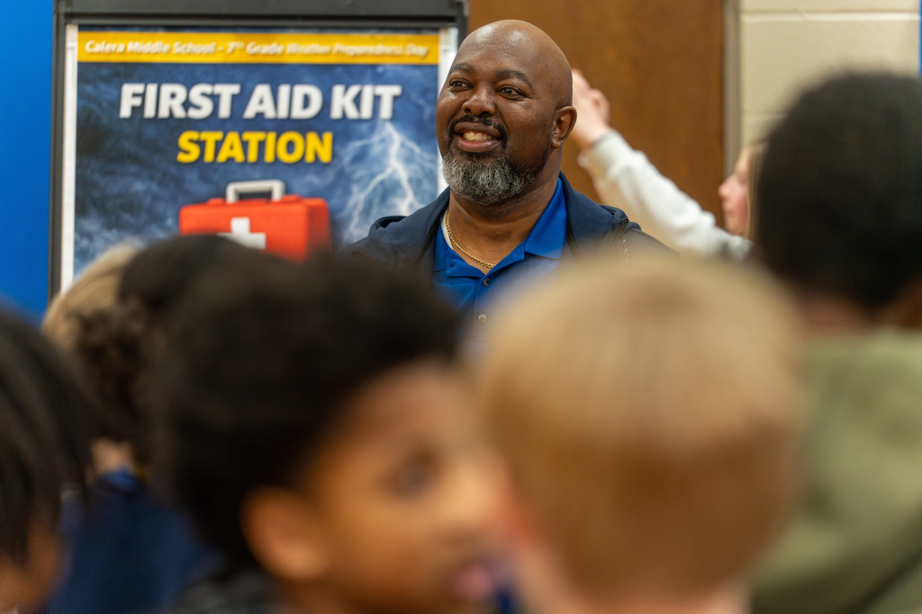 Guest speaks to students.