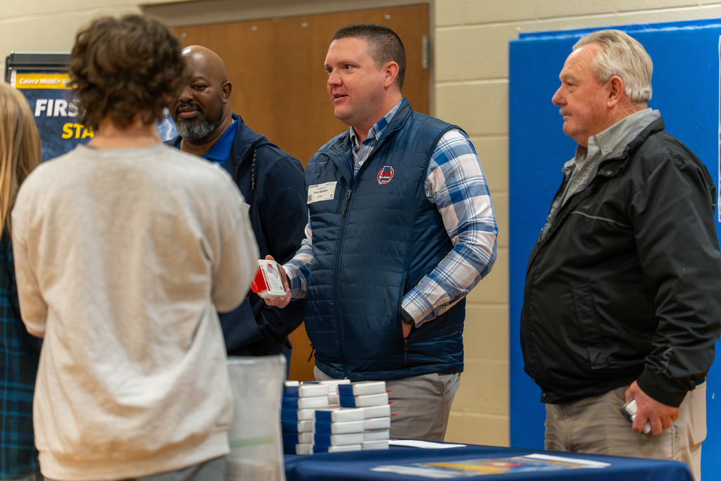 Guests speak to students.