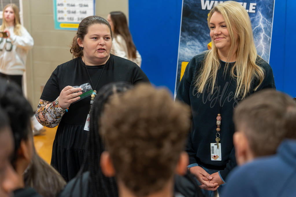 Guests speak to students.