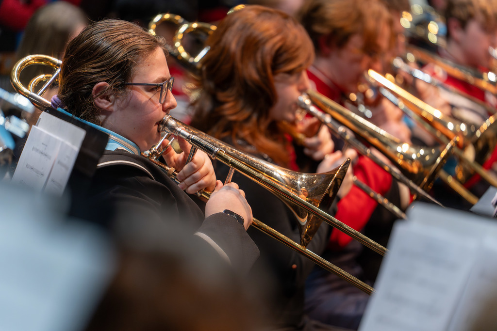 Students play the trombone.