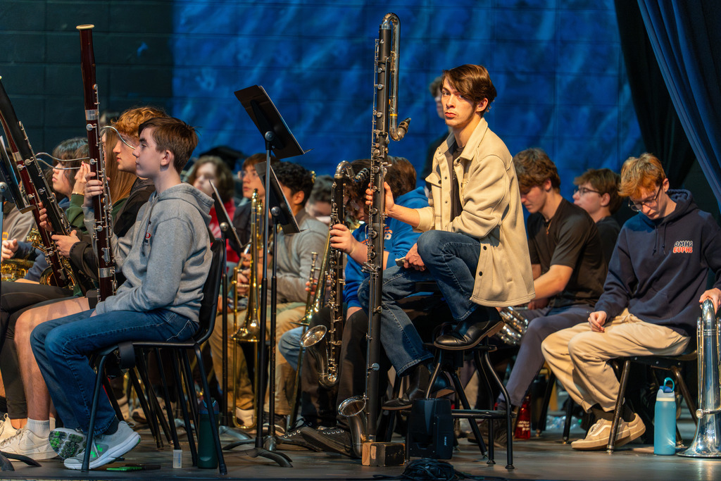 Students with instruments.