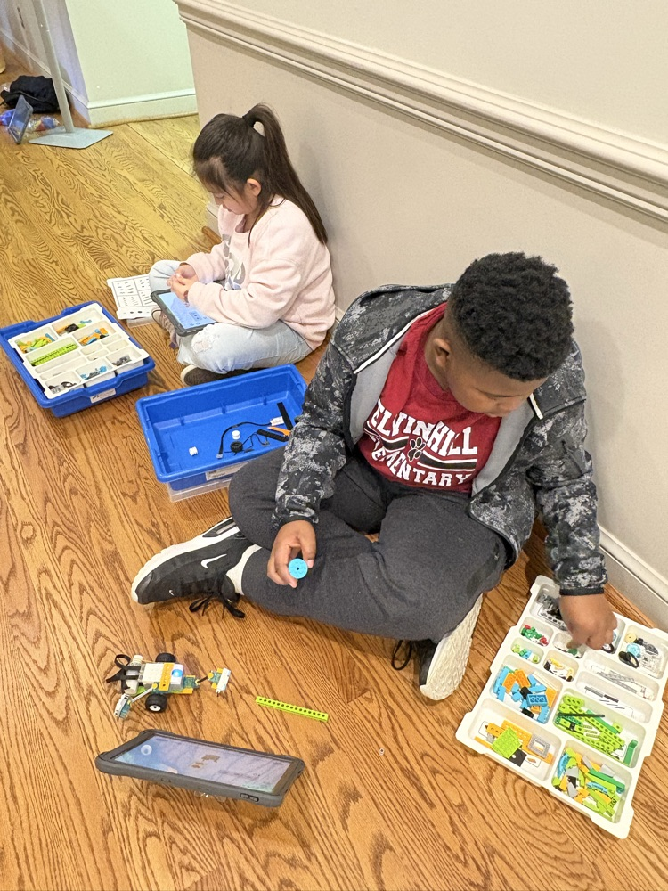 Student students working with Lego we do