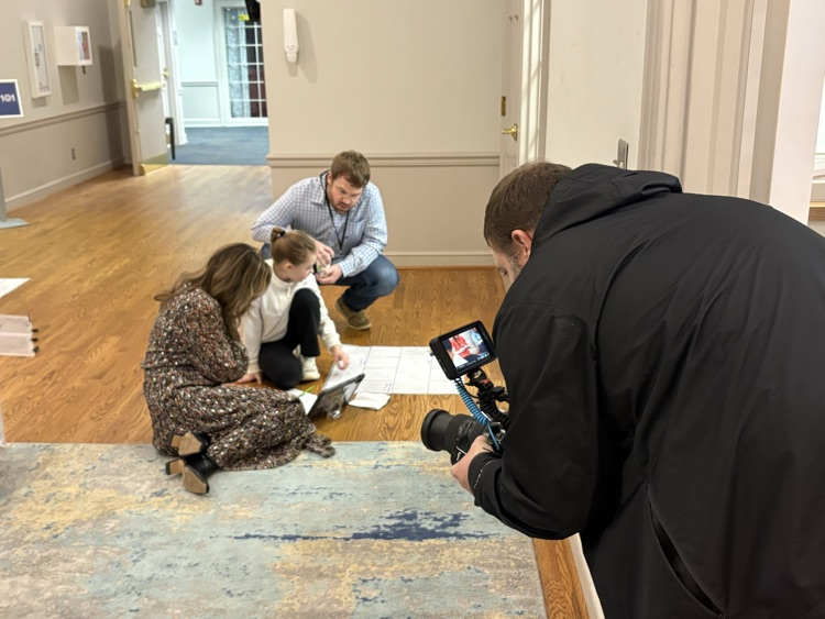 Videographer gets footage of students demonstrating root robot
