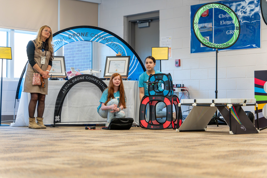 Students fly drones at Showcase of Schools.