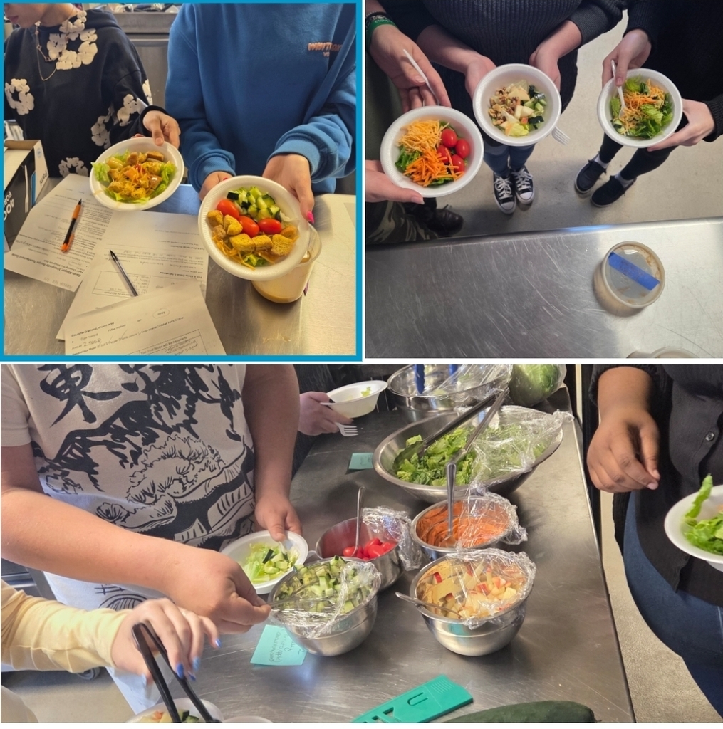 Students displaying their salads with scratch made vinaigrettes 