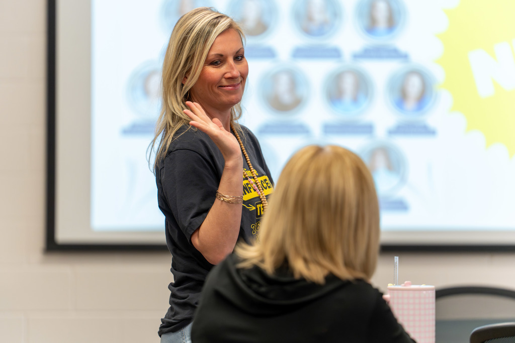 A teacher is recognized.