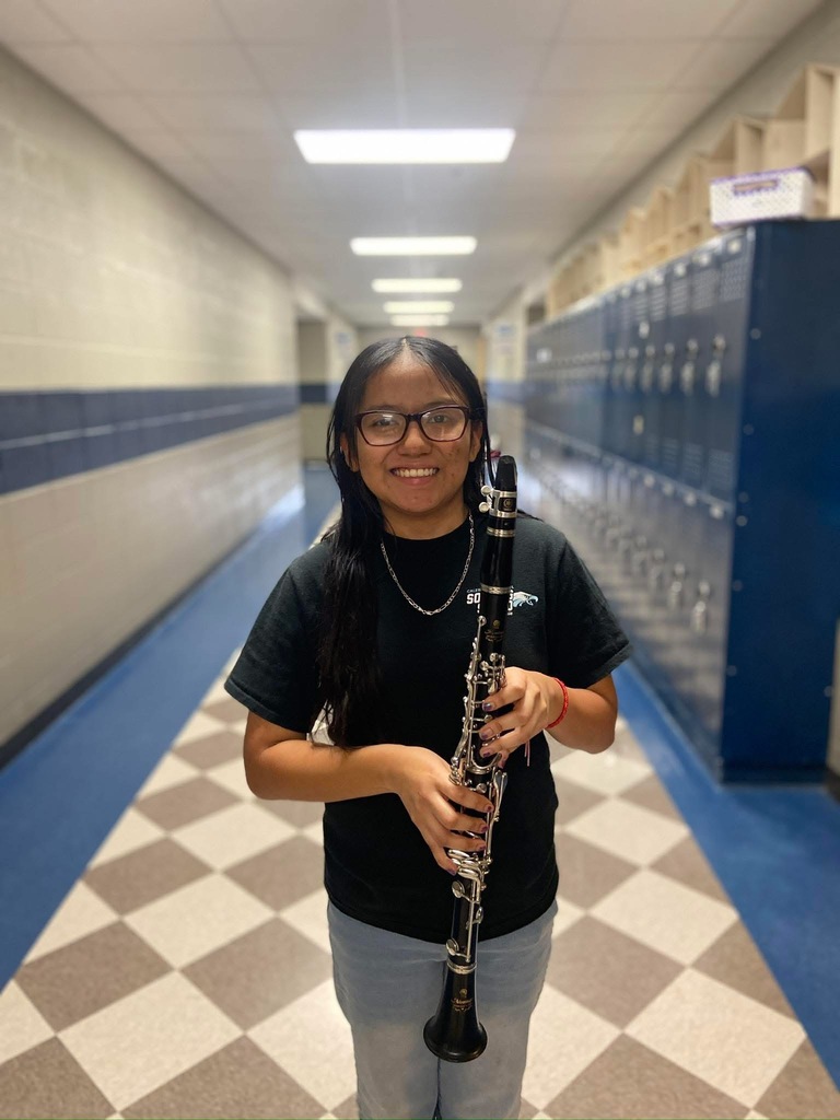 Evelyn holding a clarinet