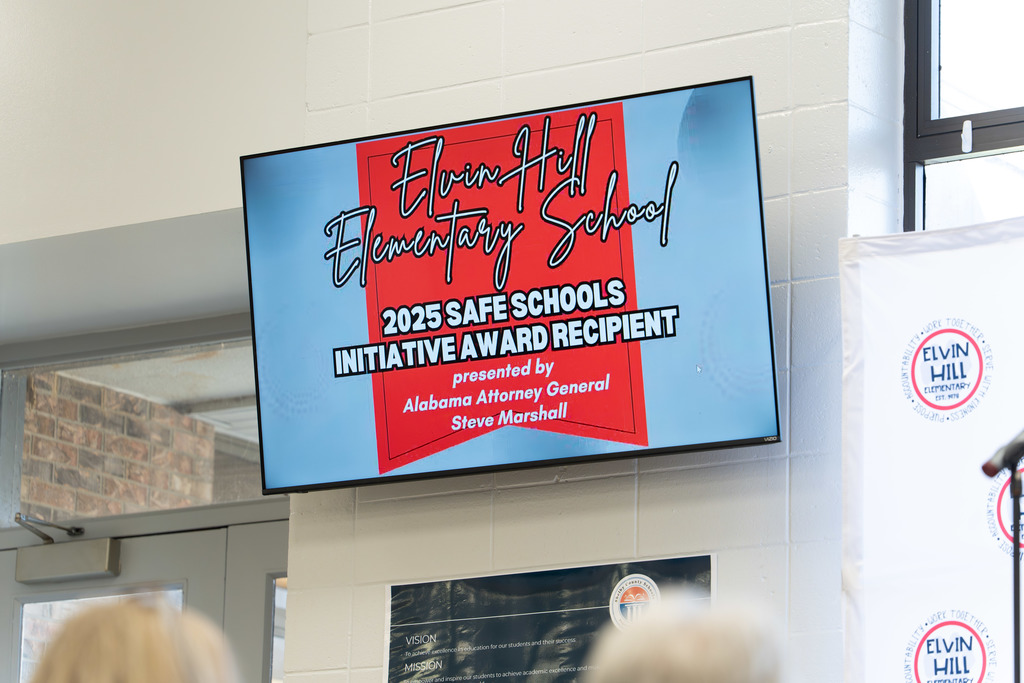 News board displaying the award ceremony announcement.