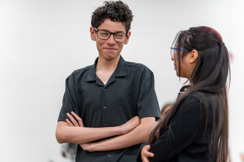 Students interact at the competition.