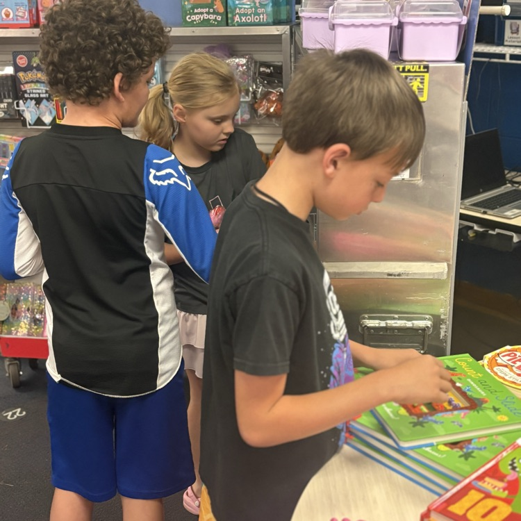 students shopping at the book fair
