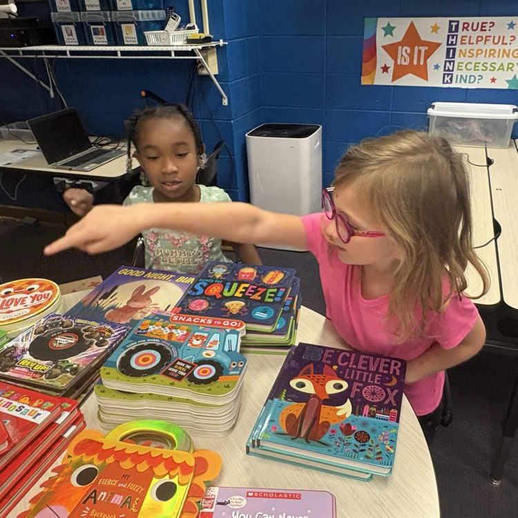 students shopping at the book fair
