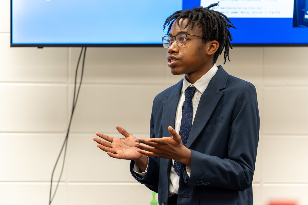 Student speaking during presentation of the engineering project 
