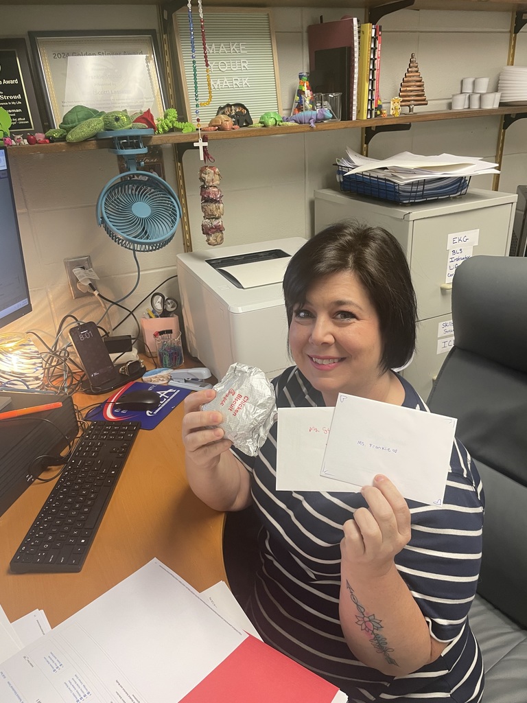 Ms. Stroud with her biscuit and appreciation notes