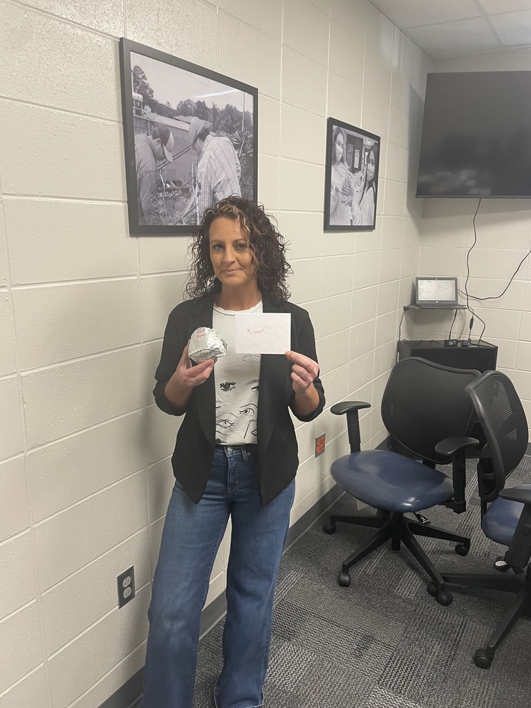 Mrs. Garrett with her biscuit and appreciation notes