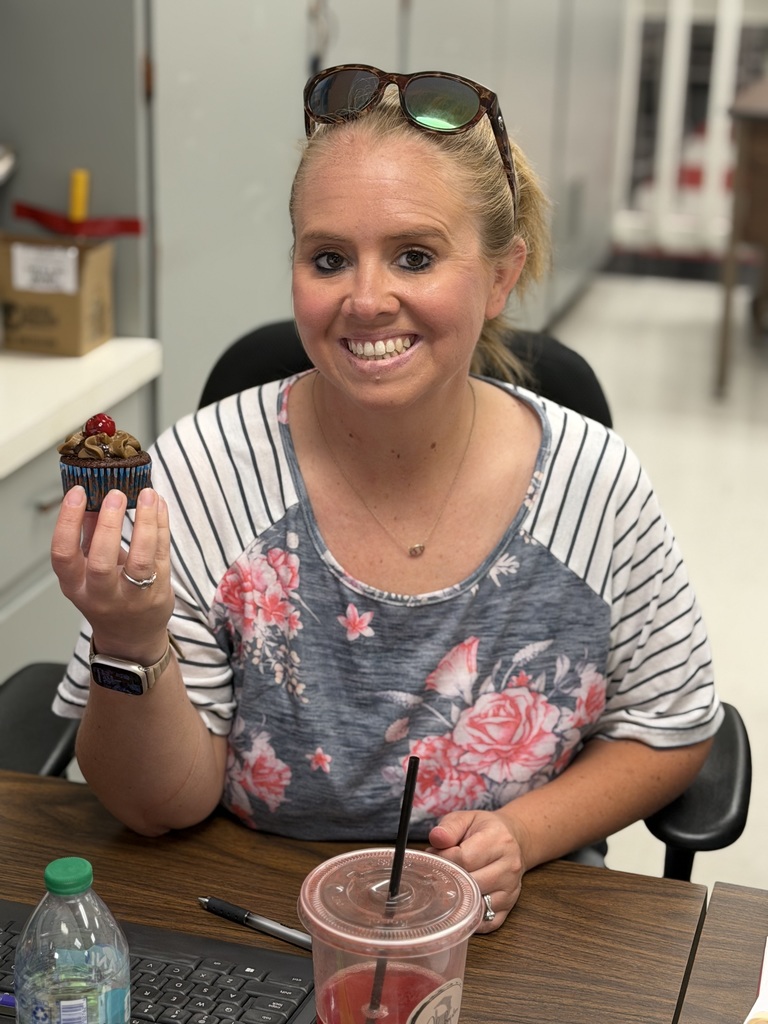 Mrs. Eades with her cupcake