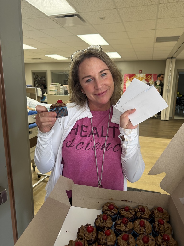 Mrs. Campbell with her cupcake