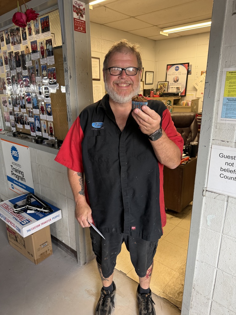 Mr. Irwin with his cupcake