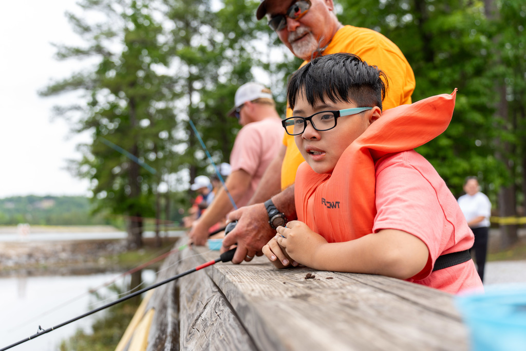 Student fishes at Gone Fishing event.