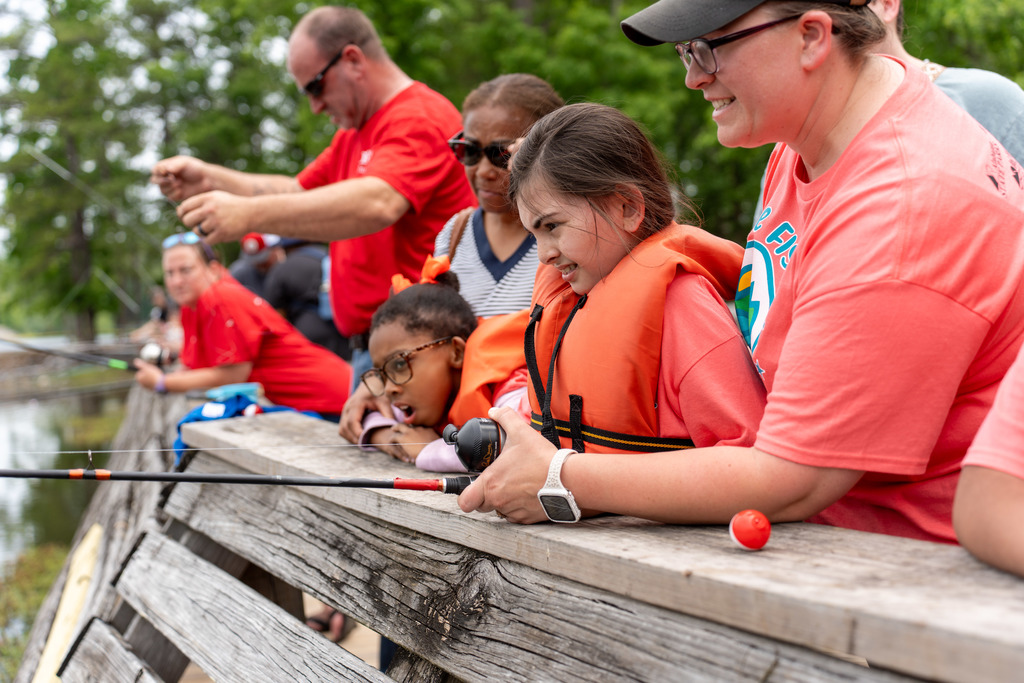 Student fishes at Gone Fishing event.