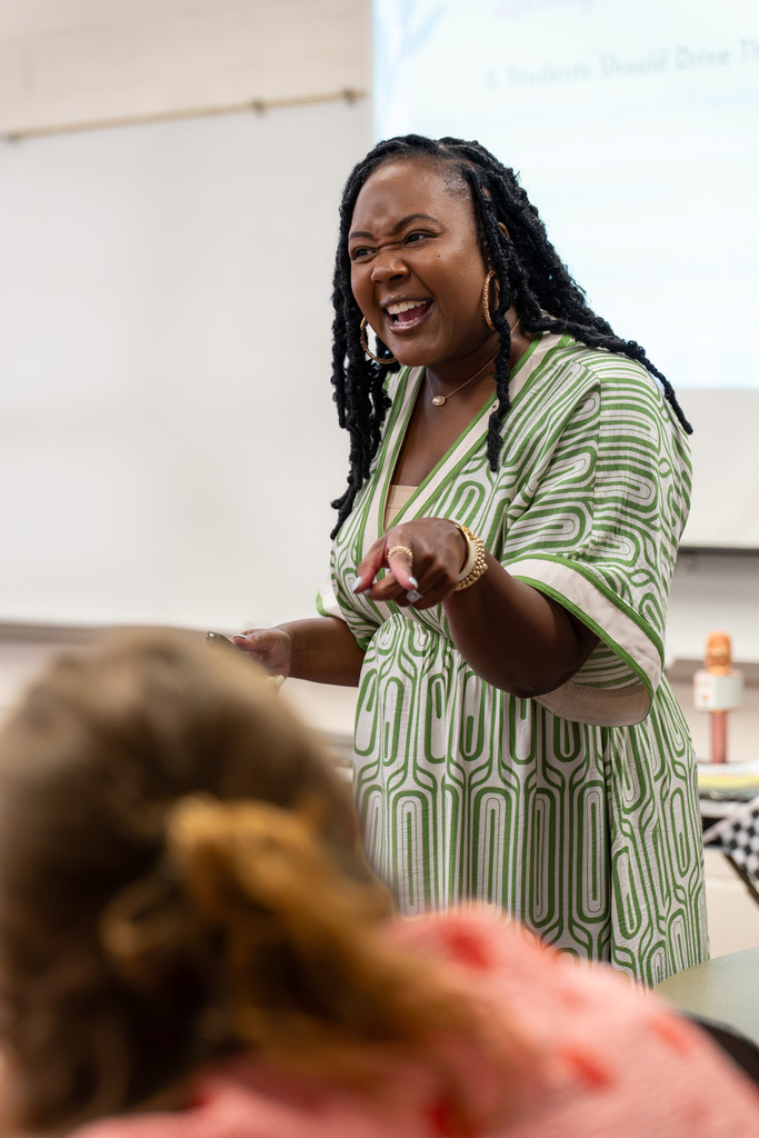 An educator engages participants during an interactive professional learning workshop.