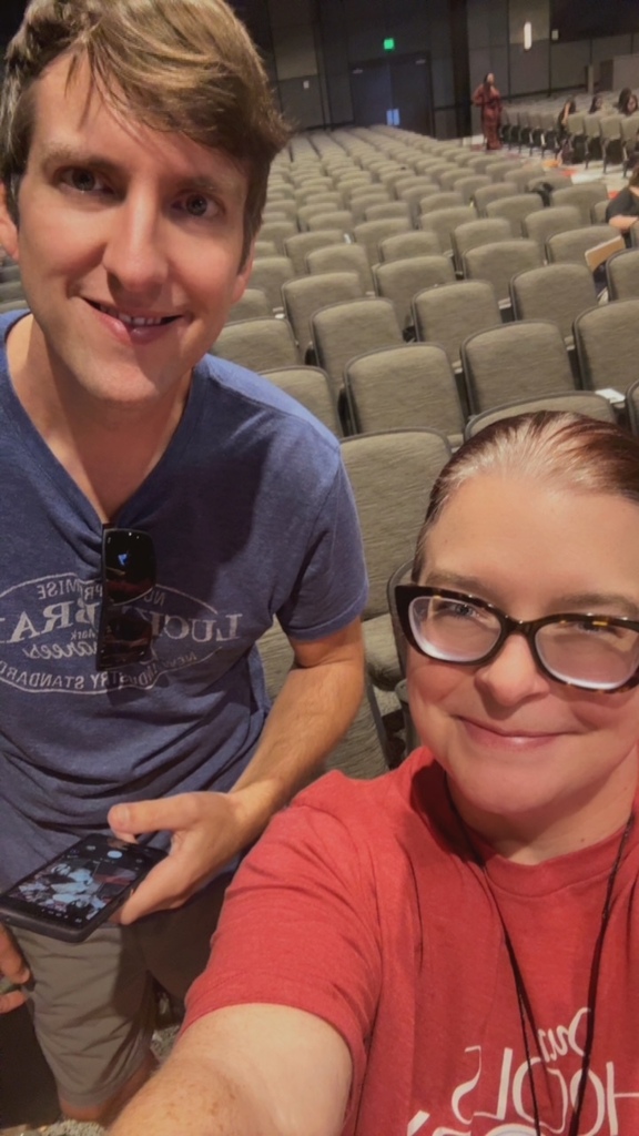 Group photo of the OMMS yearbook sponsors in a high school auditorium