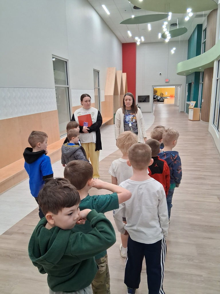 The Little Yellow Jackets took the boys from Little Mohawks around the school. 