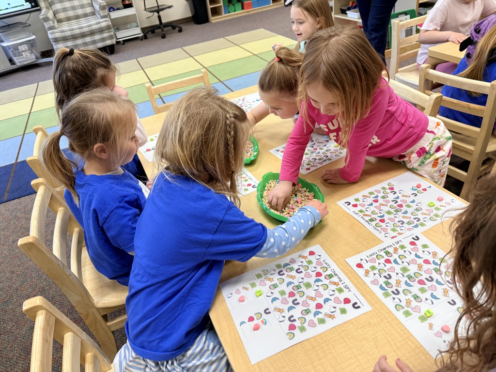 Early learners playing "I SPY" with Lucky Charms.