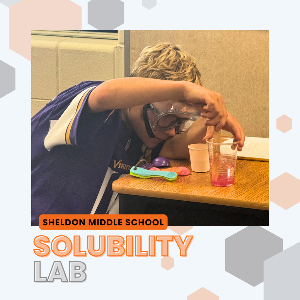Sheldon Middle School 5th grade students mixed different substances in water to see if they were soluble. This student is mixing a red powder in his water to discover that it is not soluble in water because it doesn't dissolve.