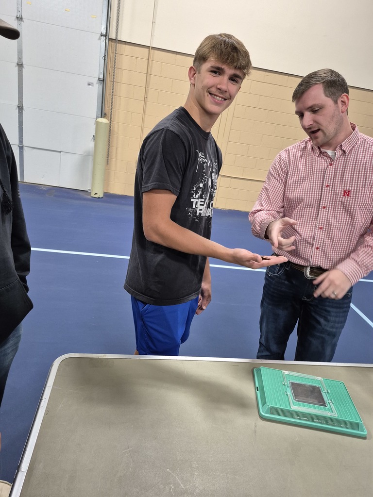 Jhet holding a Madagascar Hissing Cockroach