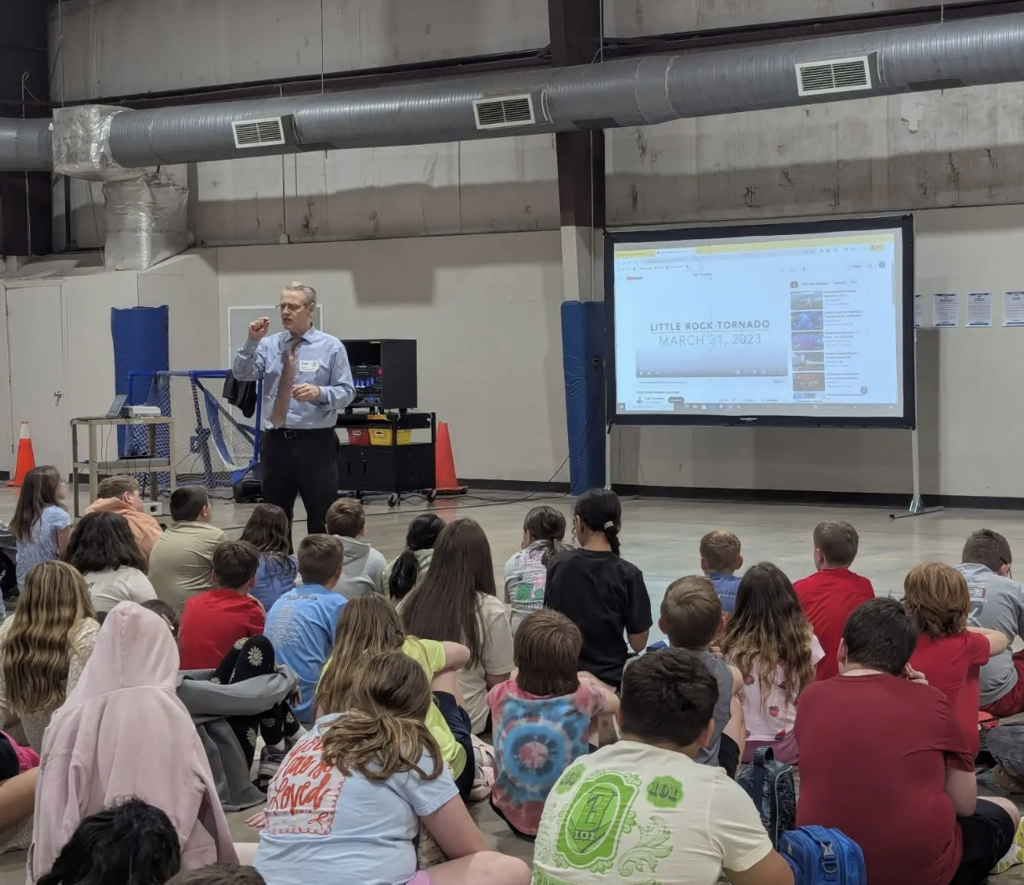 Todd Yakoubian teaching 5th graders at EEI about storm safety