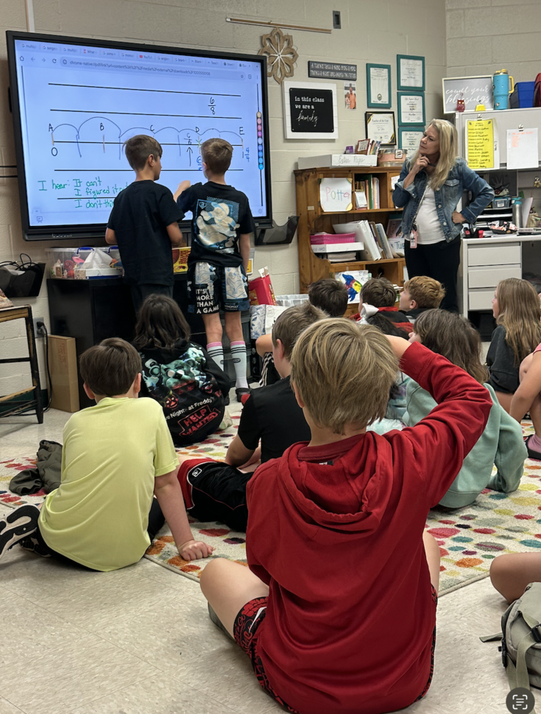 Students comparing fractions on a number line