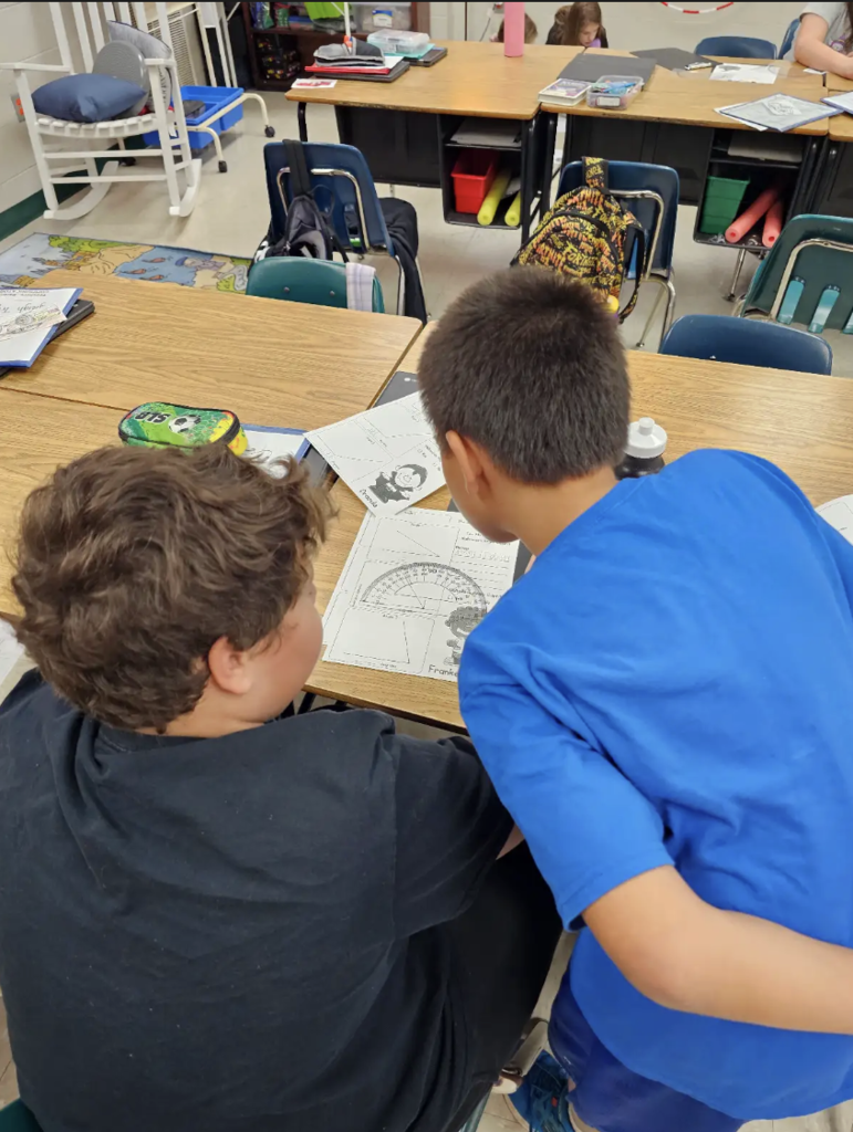 These 4th graders are angle experts! Measuring each angle carefully with their protractors.