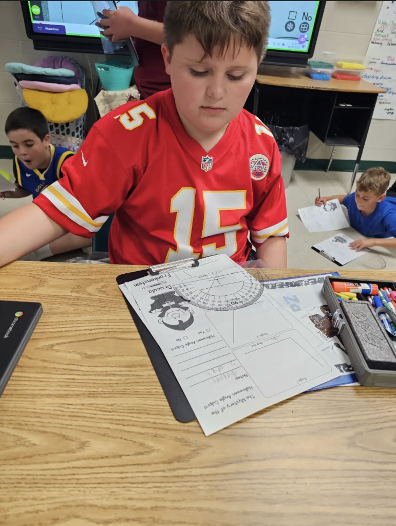 These 4th graders are angle experts! Measuring each angle carefully with their protractors.