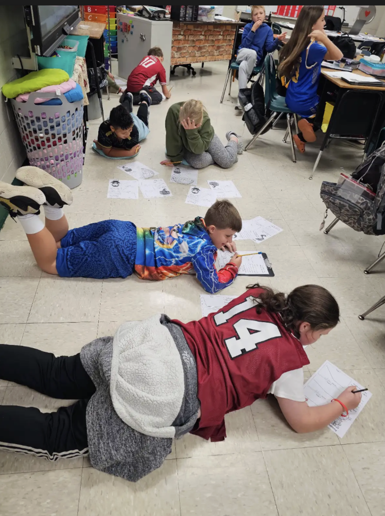 These 4th graders are angle experts! Measuring each angle carefully with their protractors.