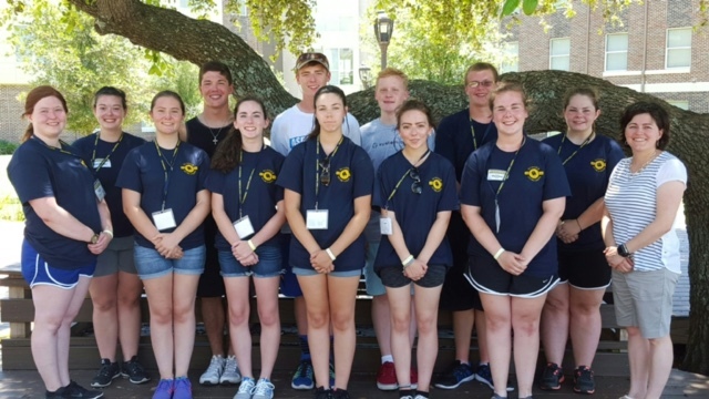 Band Students pose for picture at leadership camp