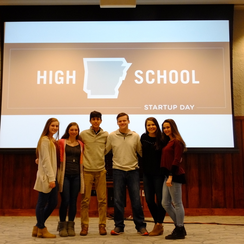 The six students smile for a picture after their big win at the High School Start-up day competition.
